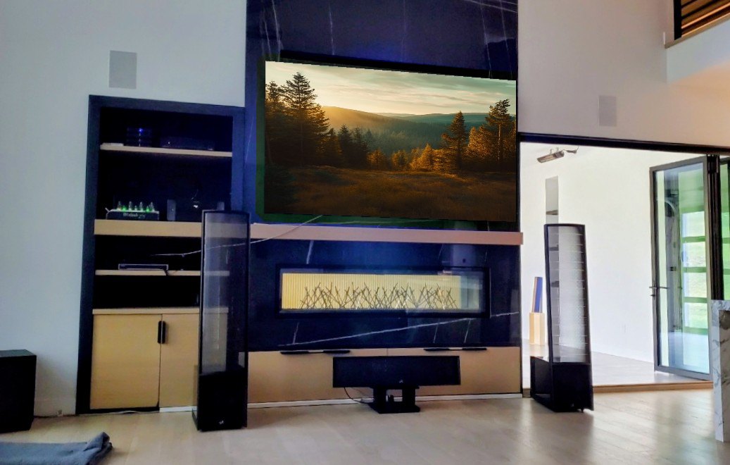 Media wall with fireplace and tower speakers installed in a Calgary home